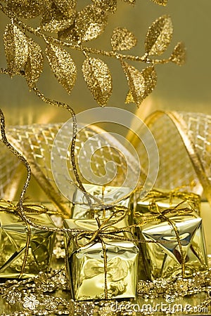 gift-boxes-on-golden-thumb3862685.jpg